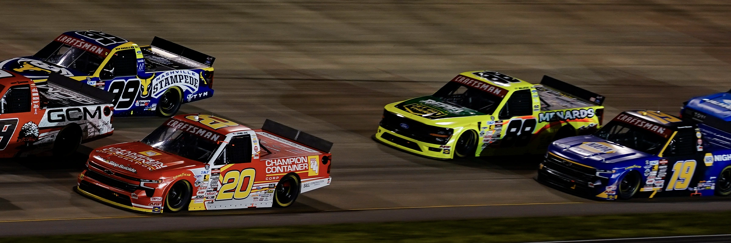 No. 20 Champion Container truck racing under the lights at Nashville